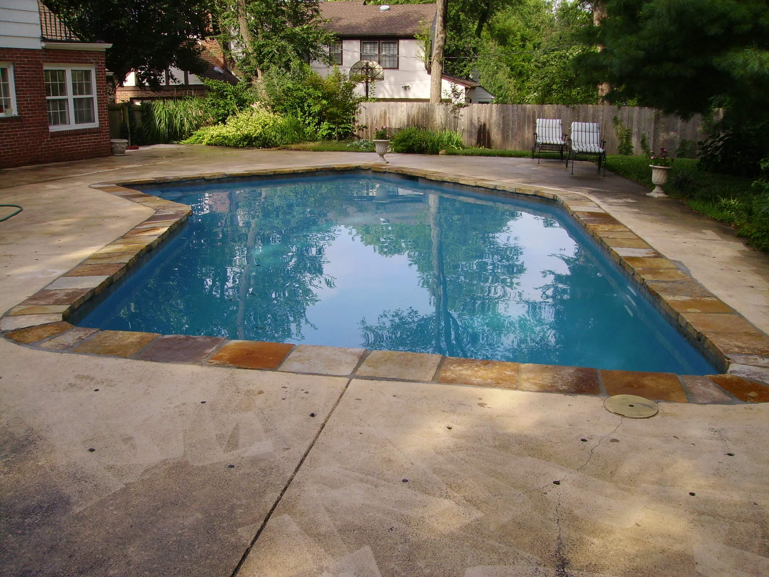 New Swimming Pool Coping, Stones, and Bricks - Mid-America Pool Renovation
