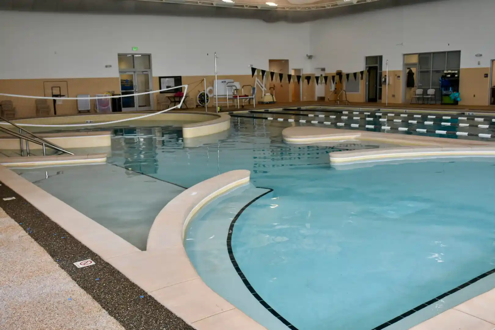 After with New Colored Concrete Coping, Tiled Racing Lanes & Quartz Diamond Brite Interior