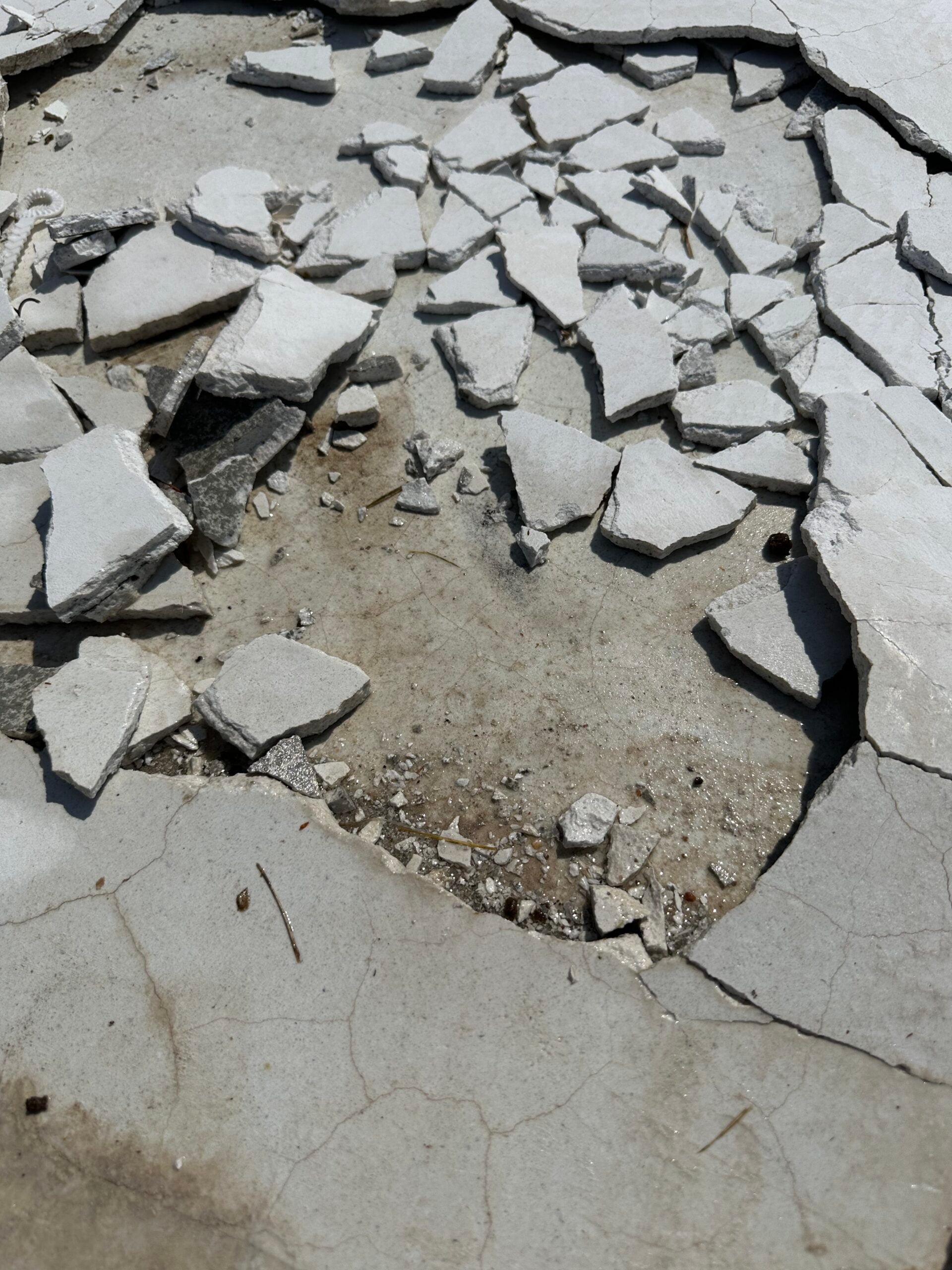 Before-Plaster Popping off on the floor of the pool